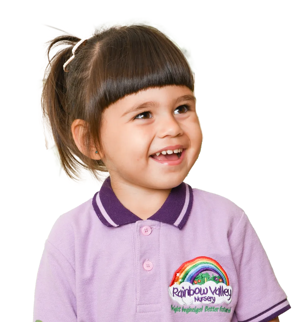 Smiling girl in Rainbow Valley Nursery uniform