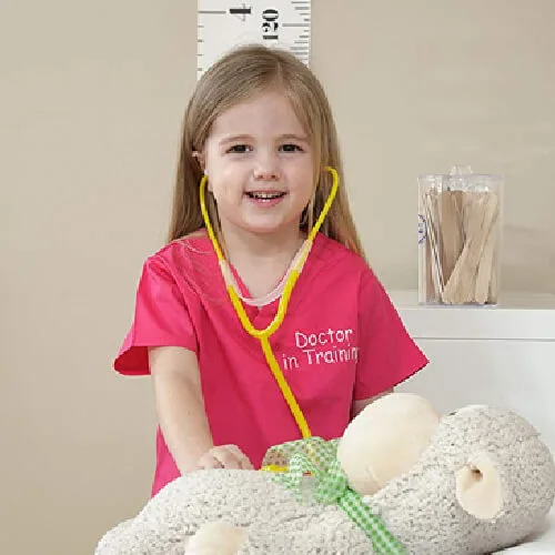Young girl smiling during playtime at nursery