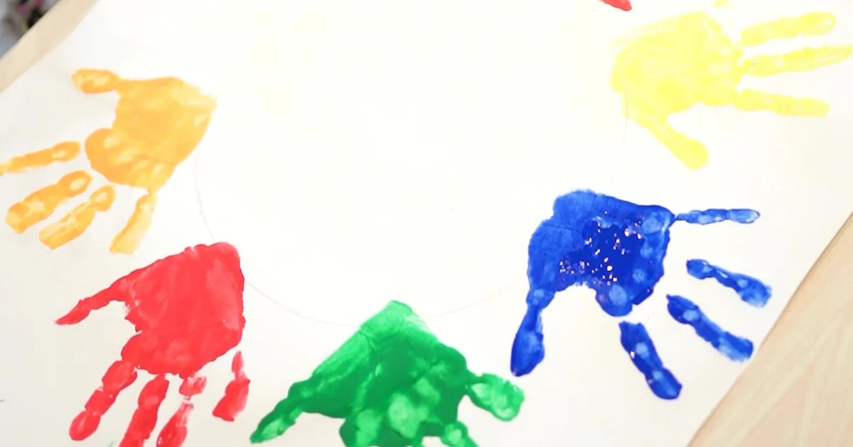 Colourful handprint painting made by children at Rainbow Valley Nursery